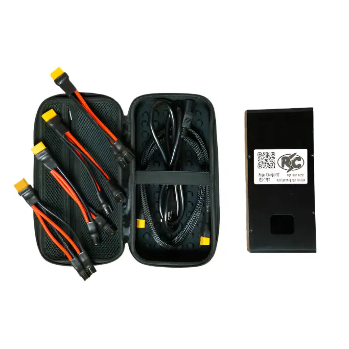 Roger Charger SC battery charger kit including multiple connector cables in a black zippered carrying case next to the charger unit for electric unicycle use.