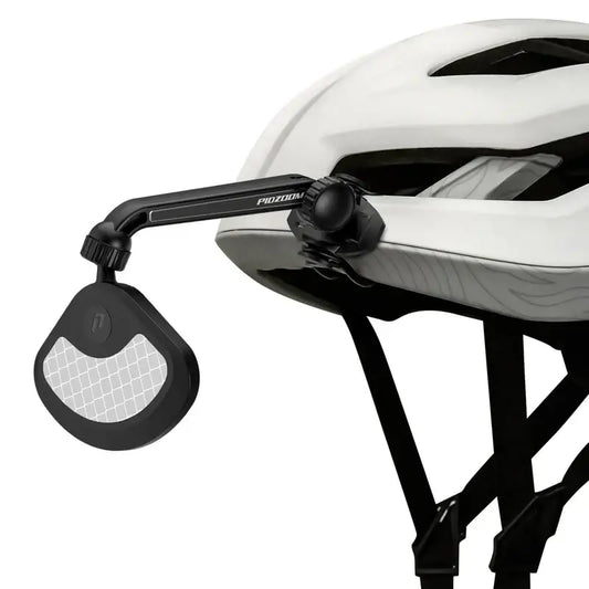 Pidzoom Helmet Mirror attached to a white bike helmet, featuring an adjustable arm and reflective surface for enhanced rear visibility and safety.