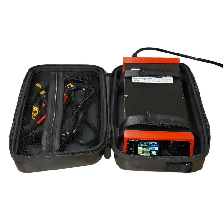 Open black carrying case with charging device, cables, and accessories organized inside for Roger Charger V4SC electric unicycle charger.